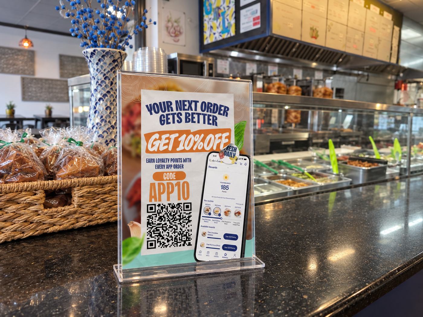 Campanha de lançamento do app: display de balcão (simulação), criado pela CGRabbit para o Garlic'n Lemons